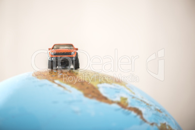 Offroad car on globe