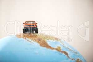 Offroad car on globe