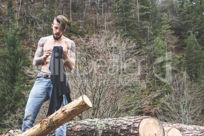 Men dress in the forest