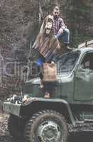 Young man and girl on truck