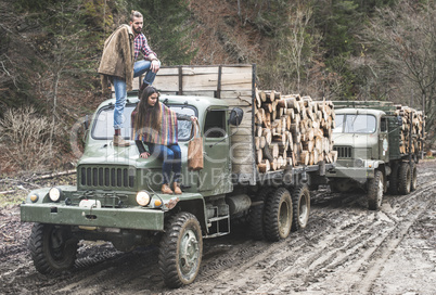 Young man and girl on truck