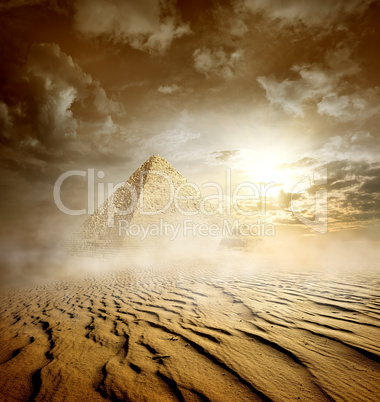 Storm clouds and pyramids