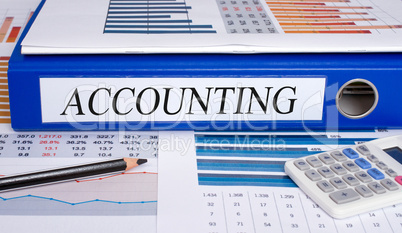 Accounting - blue binder in the office