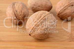 Wallnuts over wood