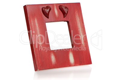 Red wooden picture frame with hearts