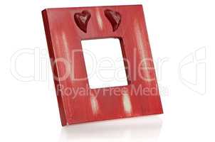 Red wooden picture frame with hearts