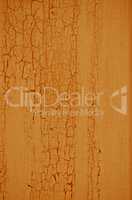 Yellow paint on wood background