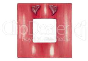 Red wooden picture frame with hearts
