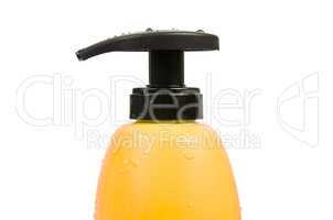 Close up of yellow shampoo bottle cap