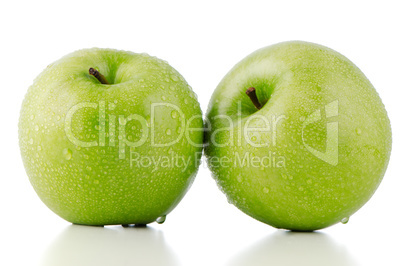 Two fresh green apples