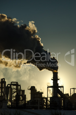 Smoking chimney  at sunset