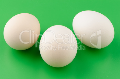 Three brown eggs
