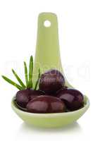 Olives on ceramic spoon