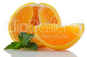 Orange fruit segment and mint leaf