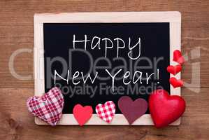 Blackboard With Textile Hearts, Text Happy New Year