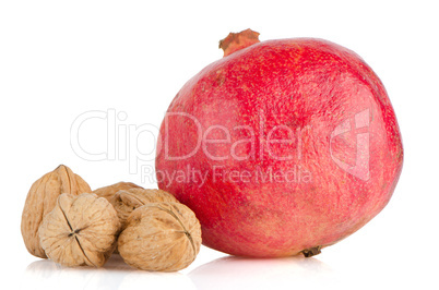 Ripe pomegranate fruit and nuts