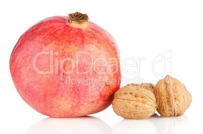 Ripe pomegranate fruit and nuts