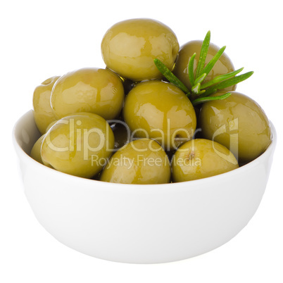 Green olives in a white ceramic bowl