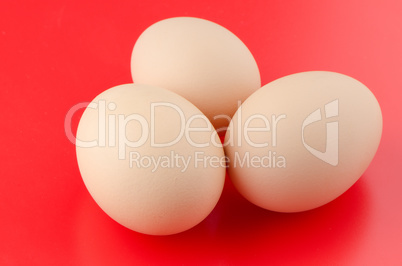 Three brown eggs