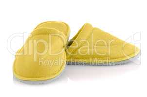 A pair of yellow slippers