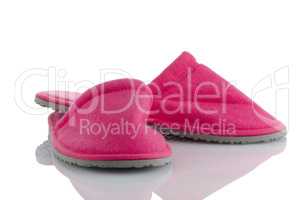 A pair of pink slippers