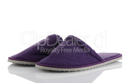 A pair of purple slippers