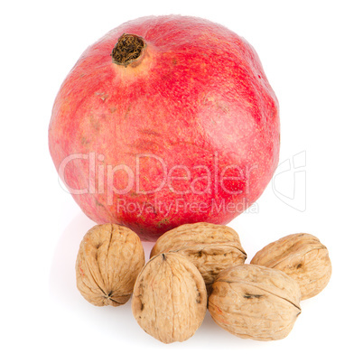 Ripe pomegranate fruit and nuts