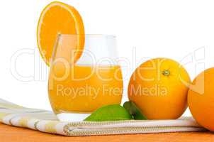 Cup of orange juice and fresh orange