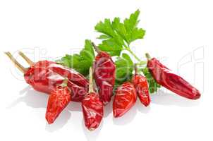 Red chili or chilli pepper and parsley leaves