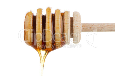 Honey on wooden drizzler