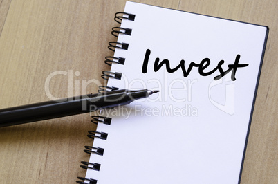 Invest write on notebook