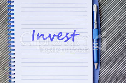 Invest write on notebook