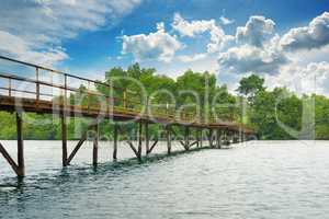 Wooden bridge over the lake