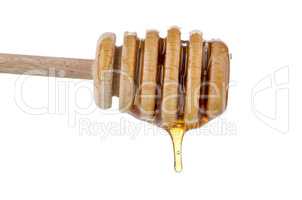 Honey on wooden drizzler