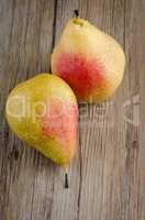 Pears in a old wooden table