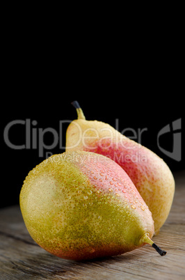 Pears in a old wooden table