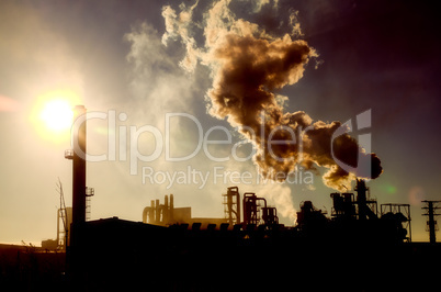 Smoking chimney  at sunset