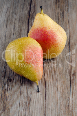 Pears in a old wooden table