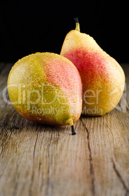 Pears in a old wooden table