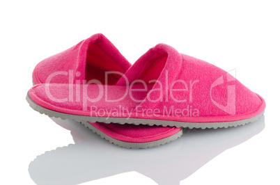 A pair of pink slippers