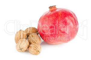Ripe pomegranate fruit and nuts