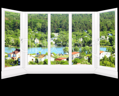 window with beautiful view to country houses and lake