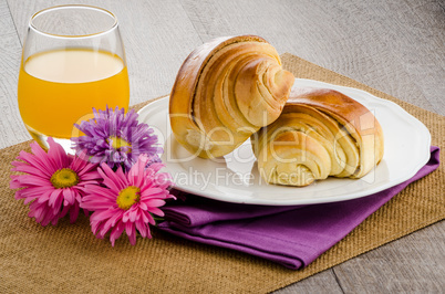 Croissants with orange juice