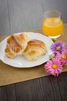 Croissants with orange juice