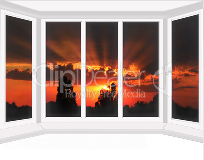 window overlooking the scarlet sunset isolated