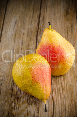 Pears in a old wooden table