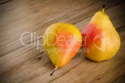 Pears in a old wooden table