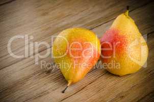 Pears in a old wooden table
