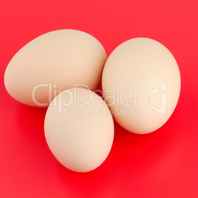 Three brown eggs