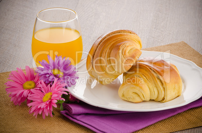 Croissants with orange juice